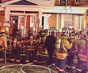 Image of firefighters at a fire call